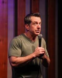 Jamie Lissow on stage
